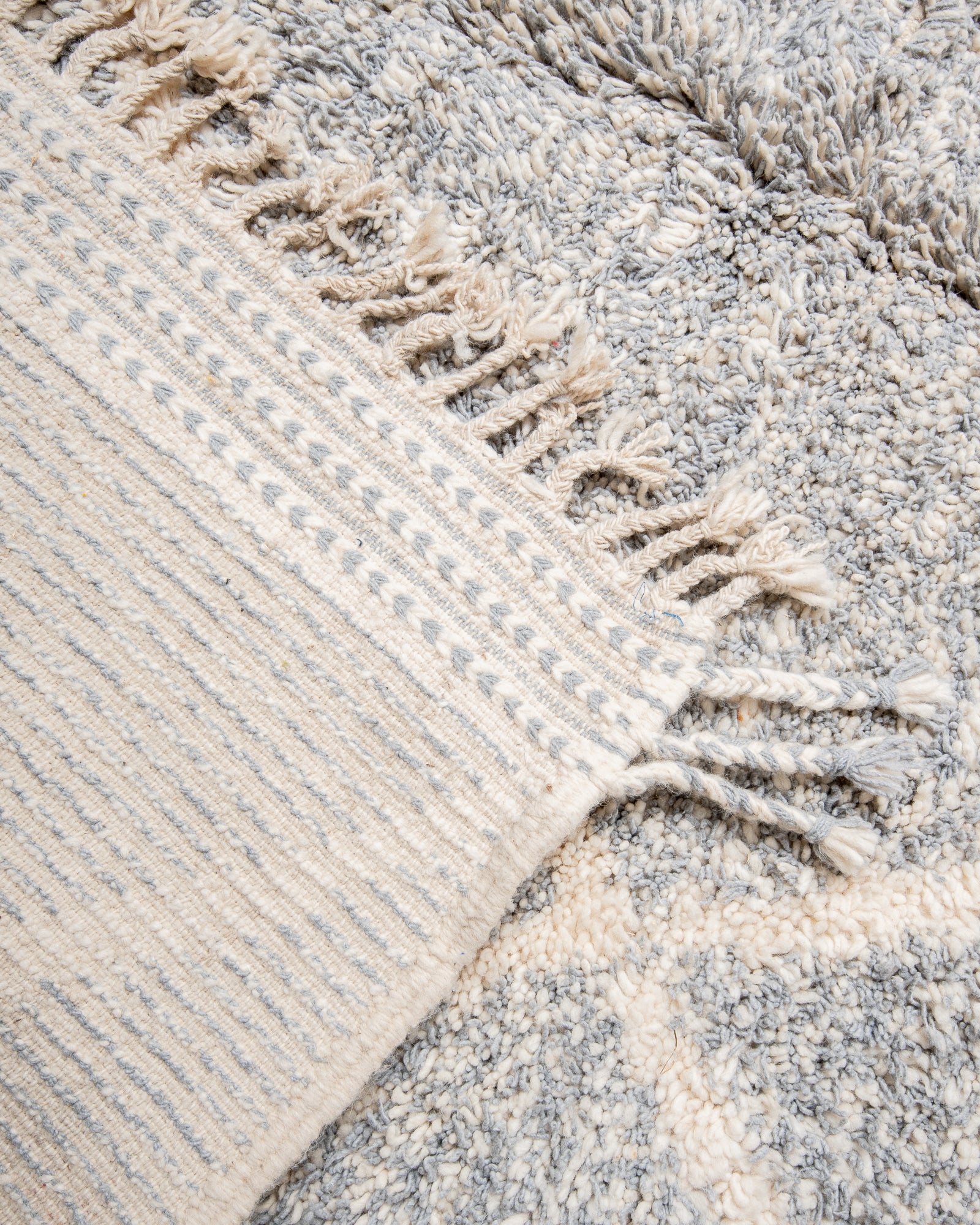 Modern, designer, handcrafted Berber rug from Morocco. Beniourain carpet with beautiful colours and patterns and fluffy wool texture.